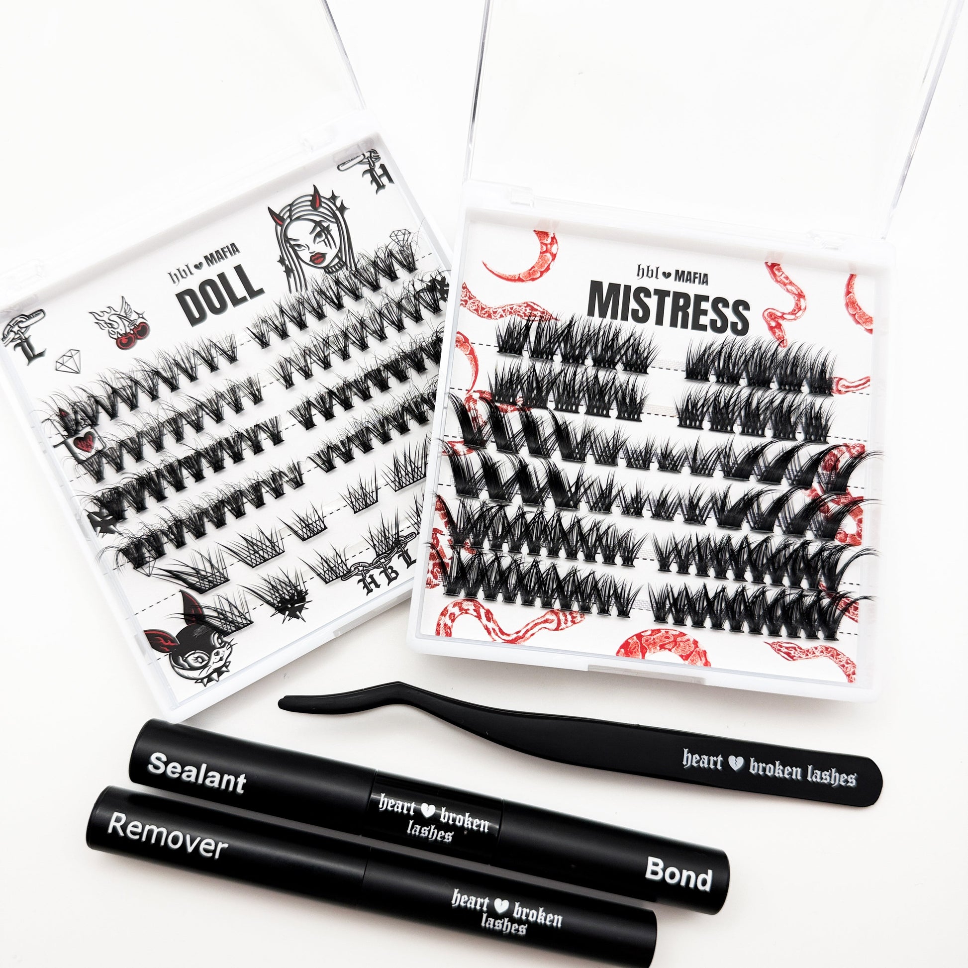 Eyelash extensions with packaging and tools on a white background